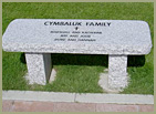 light granite bench with names and text edtched into the bench top